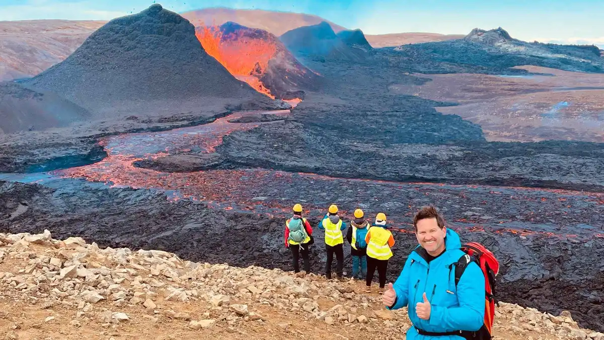 Guided group walking the 2021 lava field on a Fagradalsfjall Iceland volcano tour, Reykjanes Peninsula