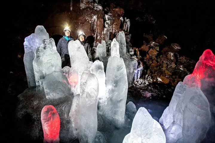 Ancient ice formations inside the Lofthellir lava tube near Lake Myvatn on an Iceland volcano tour